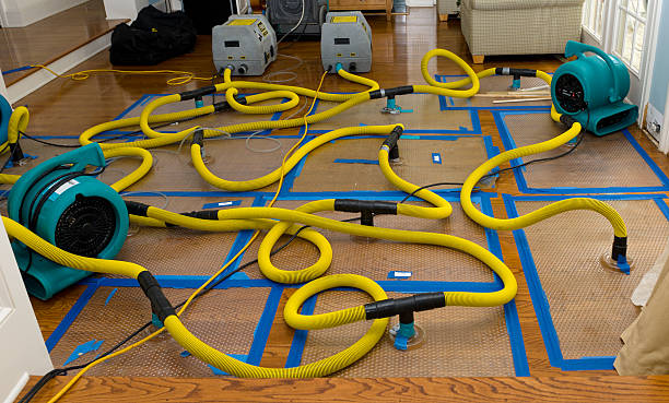 Professional Storm Water Damage Restoration technician working in Manchester, ME